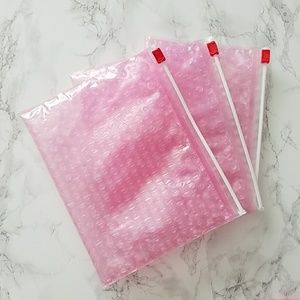 3 Glossier bags
